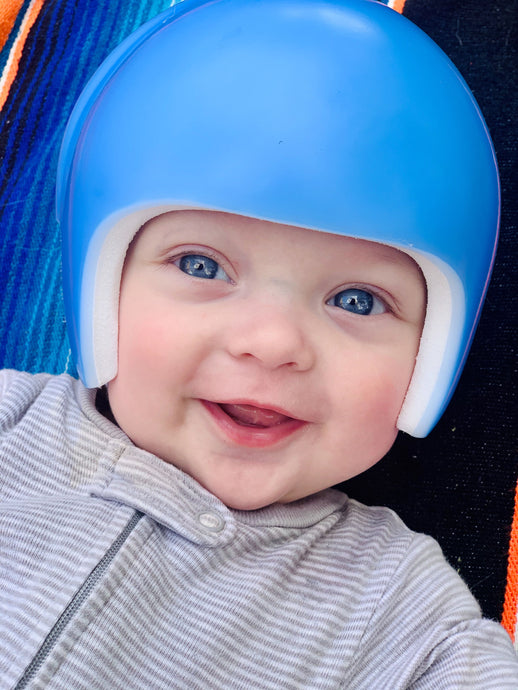 How to dress baby for sleep when wearing a helmet.