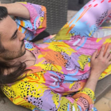 Load image into Gallery viewer, Person wearing Pronoun by Jesse Tyler Ferguson x MiliMili Modern Rainbow Adult Robe, bamboo robe