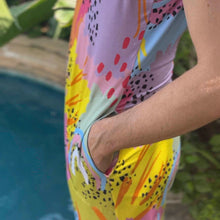 Load image into Gallery viewer, Person with hand in pocket wearing Pronoun by Jesse Tyler Ferguson x MiliMili Modern Rainbow Sleep & Play Romper