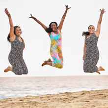 Load image into Gallery viewer, milimili pronoun modern rainbow sleep and play romper in retro rainbow print and star jasmine rompers