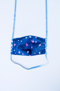back of milimili azul tropical face mask - showing navy with hot pink stars