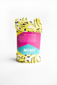 milimili Kona Banana crib sheet in packaging, banana print. modern and stylish crib sheets.