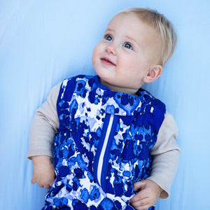 Baby wearing MiliMili Playa Blue tie dye sleep sack. Made in the USA from bamboo jersey. Best sleep sacks for toddlers. safe bamboo sleep sack, safe sleep sack
