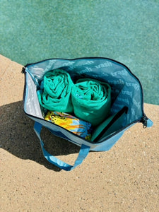 Interior shot of Ultimate beach bag in tide pool blue by Trash for MiliMili 