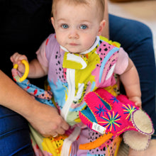 Load image into Gallery viewer, Adorable baby with Modern Rainbow print lovey by MiliMili, in collaboration with Pronoun by Jesse Tyler Ferguson