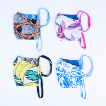 Load image into Gallery viewer, milimili summer collection face mask four-pack, featuring blue modern print, orange fish print, banana print, and pink crane print
