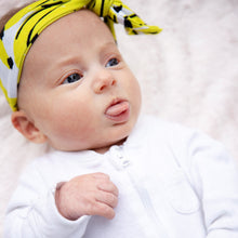 Load image into Gallery viewer, MiliMili Kona Banana bow in silky soft bamboo jersey, shown on six week old baby