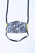 Load image into Gallery viewer, back of milimili banana tropical face mask - featuring black and white marble print