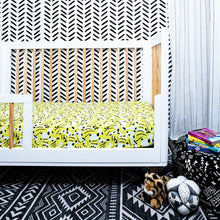 Load image into Gallery viewer, MiliMili tropical banana print bamboo crib sheet shown in modern crib, softest crib sheet ever