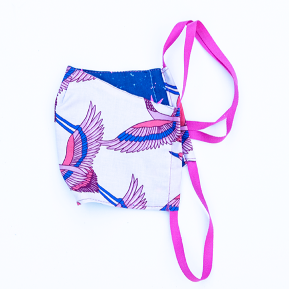 crane print pink purple and blue reversible cloth face mask with blue star print on reverse