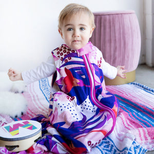 milimili puebla rosa pink purple blue and red floral sleep sack. The perfect new parent gift - both useful and cool. 