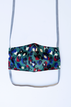Load image into Gallery viewer, front of milimili leopard face mask - featuring dark teal, blue and red leopard print 