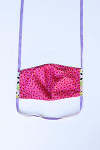 back of milimili monkey print face mask featuring pink and red daisy print