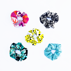 five scrunchies in all available prints: kauai one, kona banana, gauva sunset, kilauea, and aquamarine